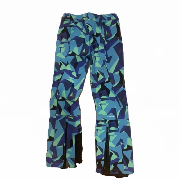 Spyder Orb softshell ski pants with a geometric blue and green pattern - Picture 2 of 3